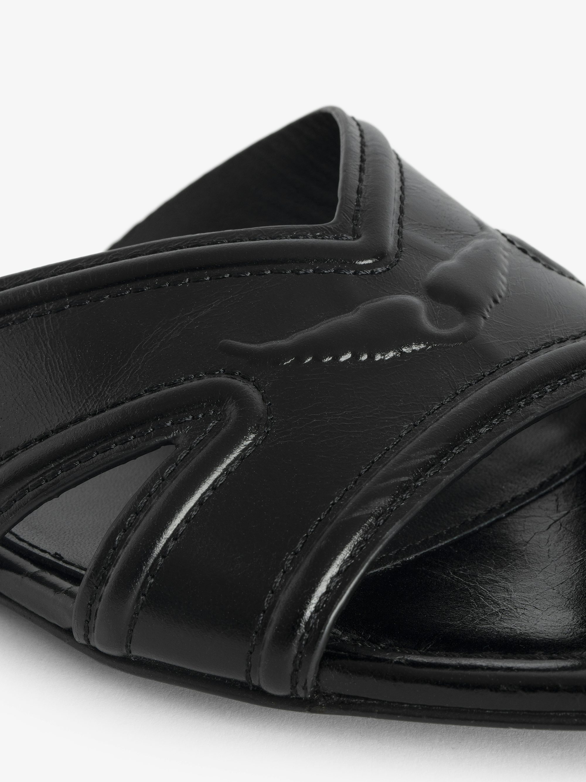 Azora Vintage Patent Mules - Mules in vintage-effect leather signed with embossed wings.